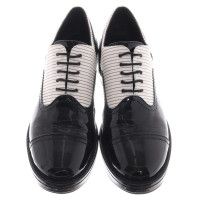 Chanel Lace-up shoes in white / black