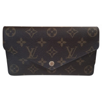 Louis Vuitton Täschchen/Portemonnaie aus Canvas in Braun