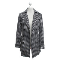 Vertigo Trench coat with polka dots