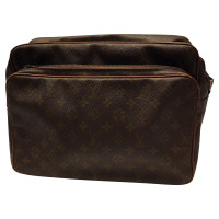 Louis Vuitton Handbag Canvas in Brown