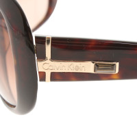 Calvin Klein Sunglasses in Brown