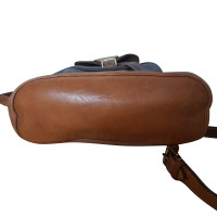 Louis Vuitton Montsouris Canvas in Brown