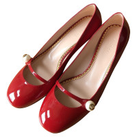 Gucci Pumps/Peeptoes Patent leather in Red