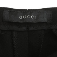 Gucci Zwarte broek met ritsen
