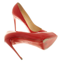 Christian Louboutin Peeptoes in red