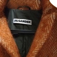 Jil Sander Jacke/Mantel aus Wolle in Orange