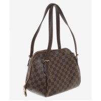 Louis Vuitton Handtas Leer in Bruin