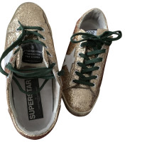 Golden Goose Sneakers Leer in Goud