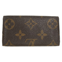 Louis Vuitton Täschchen/Portemonnaie aus Canvas in Braun