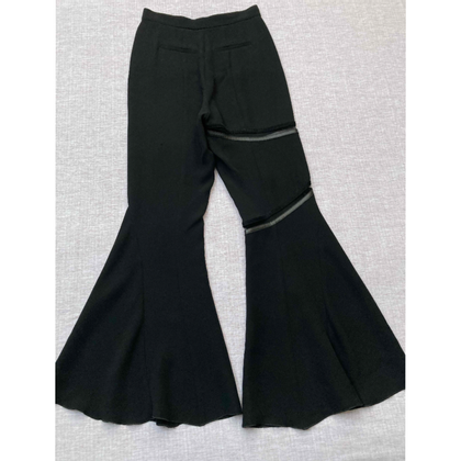 Versace Paire de Pantalon en Soie en Noir