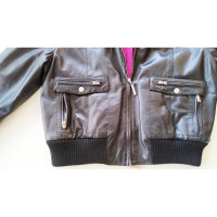 Gianni Versace Jacke/Mantel aus Leder in Schwarz