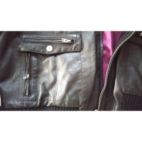 Gianni Versace Jacke/Mantel aus Leder in Schwarz