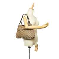 Gucci Sac à bandoulière en Toile en Beige