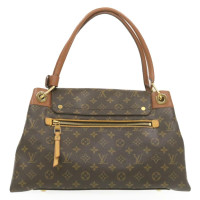 Louis Vuitton Olympe Canvas in Bruin
