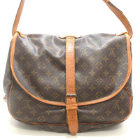 Louis Vuitton Saumur Canvas in Bruin