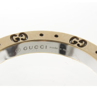 Gucci Anello in acciaio con elementi in oro