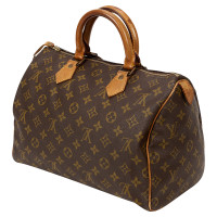 Louis Vuitton Handbag Canvas in Brown