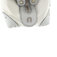 Aigner Handbag in silver and white colors