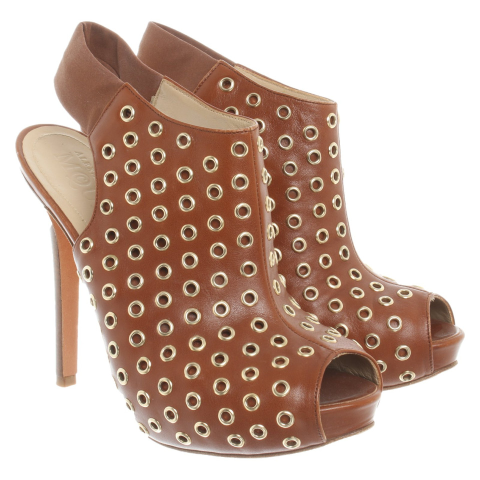 Alexander McQueen Ankle boots Leather in Brown
