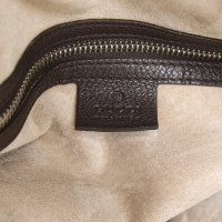 Gucci Reisetasche aus Leder in Braun