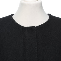Cos Jacke/Mantel aus Wolle in Schwarz