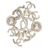 Chanel Gold colored brooch with pearls