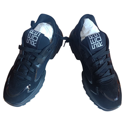 Sergio Rossi Sneakers aus Leder in Schwarz