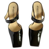 Pollini Pumps/Peeptoes en Cuir verni en Noir