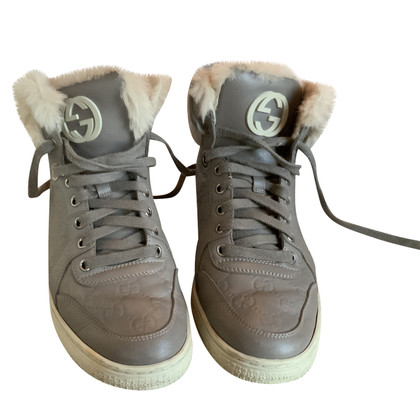Gucci Sneakers aus Leder in Taupe