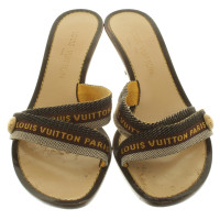 Louis Vuitton Mules with logo inlays