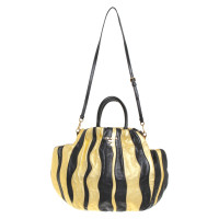 Prada Handbag in gold / black