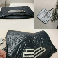 Swarovski Handtasche aus Leder in Schwarz