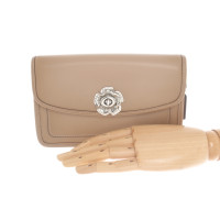 Coach clutch made of beige leather