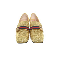 Gucci Pumps/Peeptoes in Gold