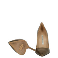 Manolo Blahnik Décolleté/Spuntate in Pelle in Oro