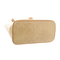 Louis Vuitton Reade Lakleer in Beige