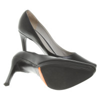 Jil Sander Pumps/Peeptoes aus Leder in Schwarz