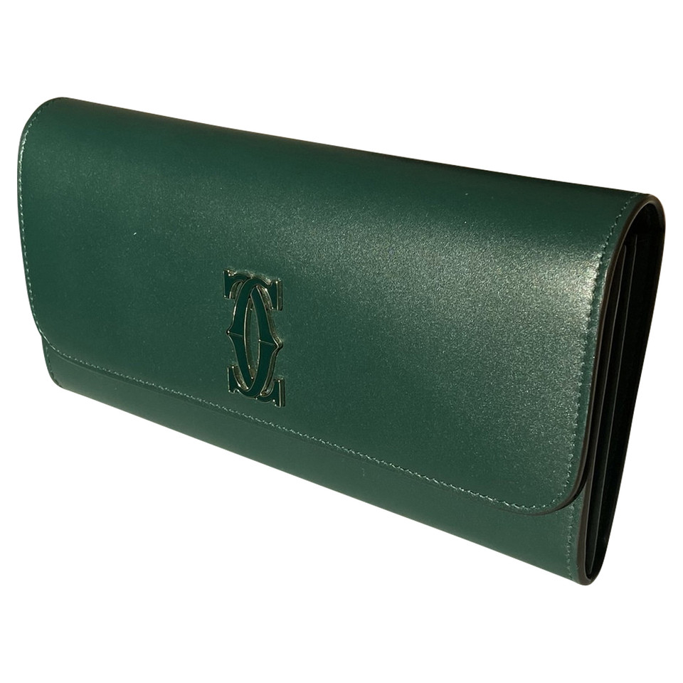 Cartier Täschchen/Portemonnaie aus Leder in Grün