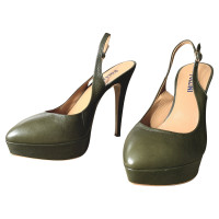 Pollini pumps / Peeptoes made of leather in green