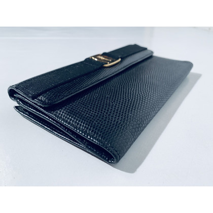 Salvatore Ferragamo Täschchen/Portemonnaie aus Leder in Schwarz