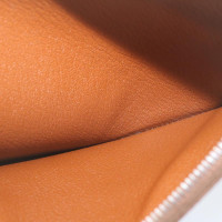 Hermès Clutch Leer in Bruin