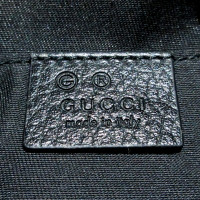 Gucci Clutch aus Leder in Schwarz