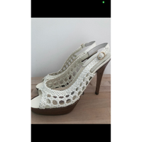 Brian Atwood Chaussures compensées en Cuir en Blanc