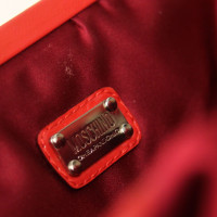 Moschino Clutch aus Seide in Rot