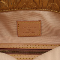 Louis Vuitton Limelight Clutch in Oro