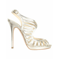 Jimmy Choo Sandalen aus Leder in Gold