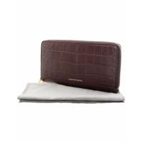 Alexander McQueen Clutch aus Leder in Braun