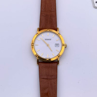 Tissot Armbanduhr aus Gelbgold in Gold