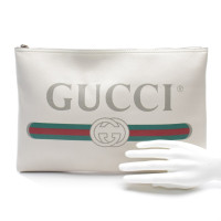 Gucci Clutch aus Leder in Beige