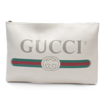 Gucci Clutch aus Leder in Beige
